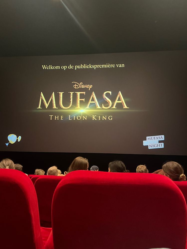 picture of mufasa title card at the movie theatre