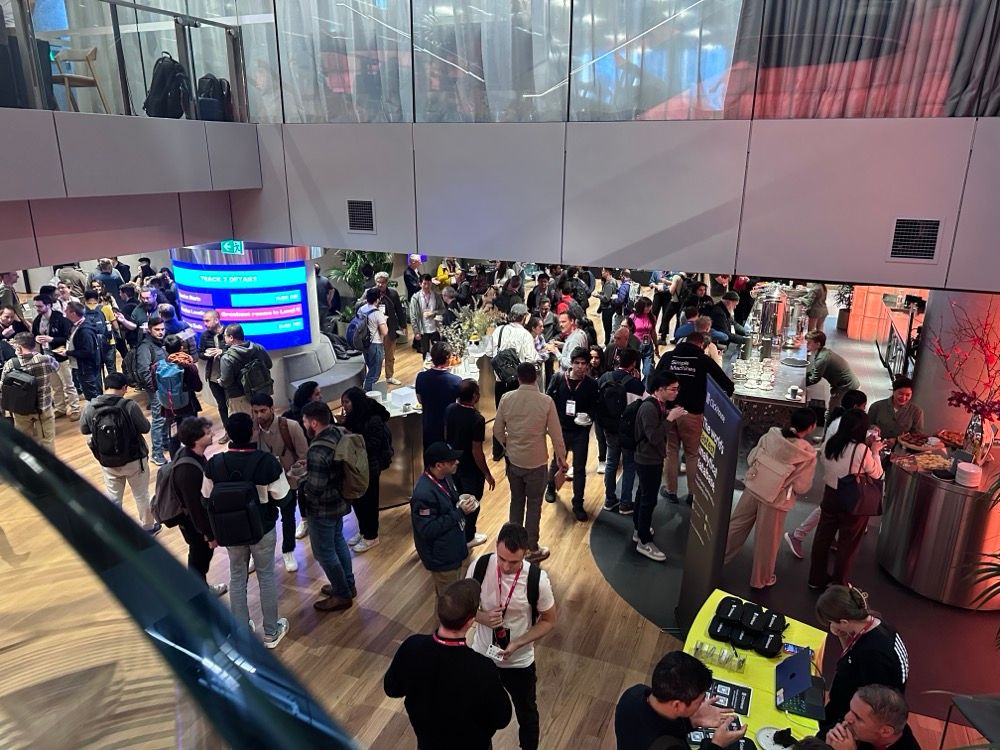 A crowd at a tech event, as seen from above