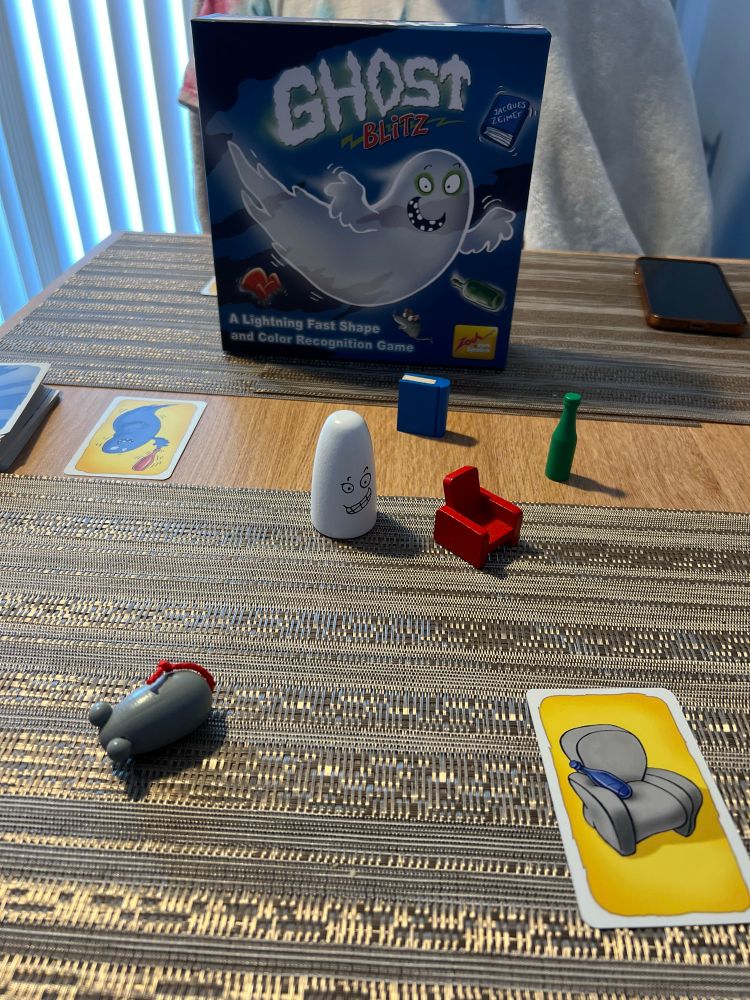 Ghost Blitz box with pieces and cards.