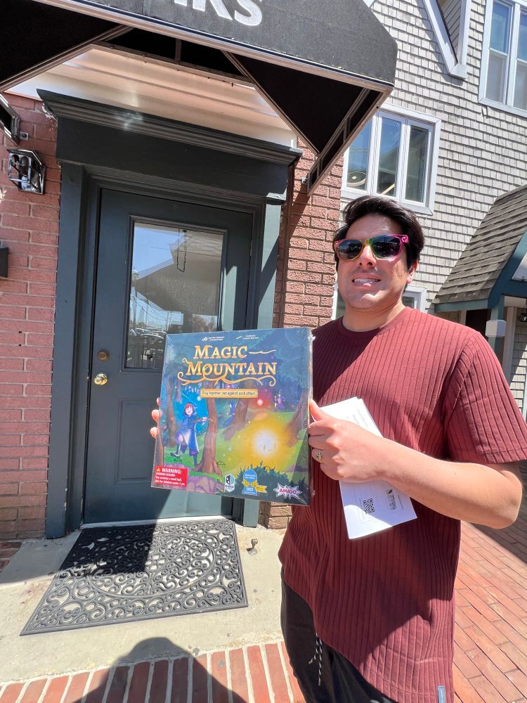 Myself holding Magic Mountain board game box.