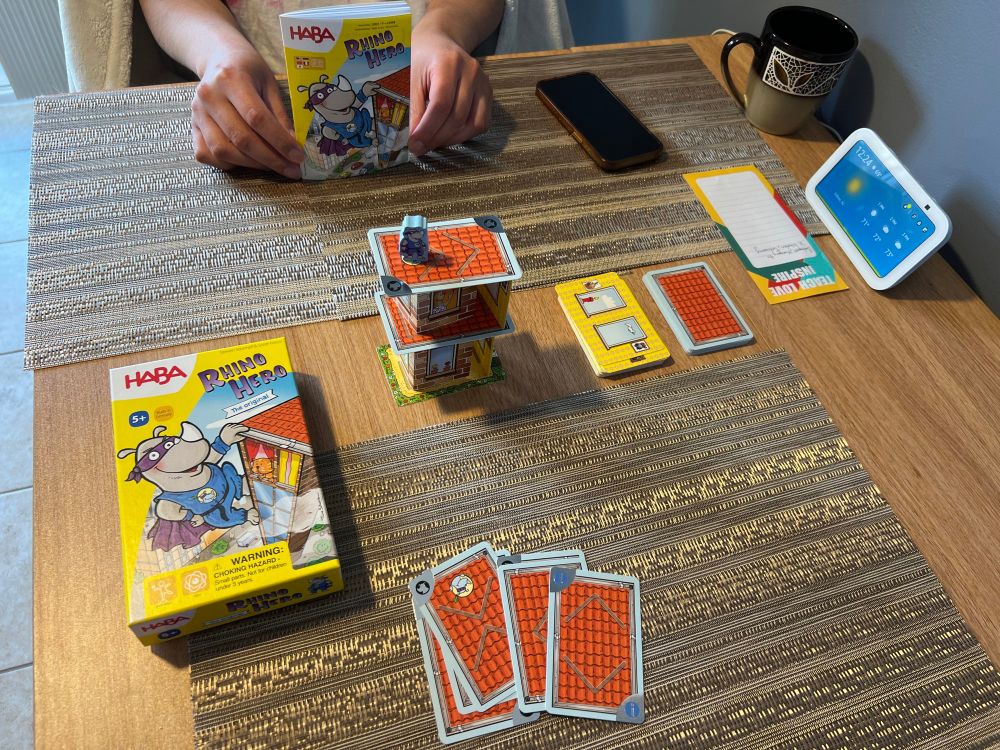 Rhino Hero cards, box and meeple.