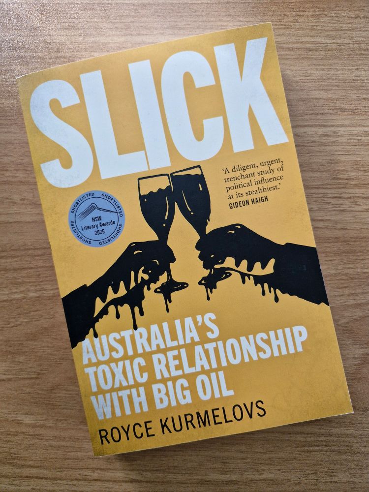 Photo of the cover of the reprint of Slick: Australia's Toxic Relationship With Big Oil, including a fancy new sticker noting it was short-listed in the non-fiction category at the New South Wales Literary awards.