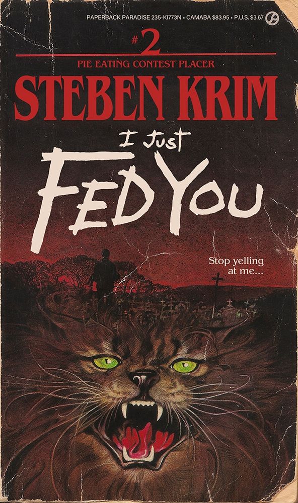 Book cover for Pet Cemetery featuring an angry cat’s face hissing as a silhouette of a man stares off. Text and title read:

I just
FED YOU
Stop yelling at me...