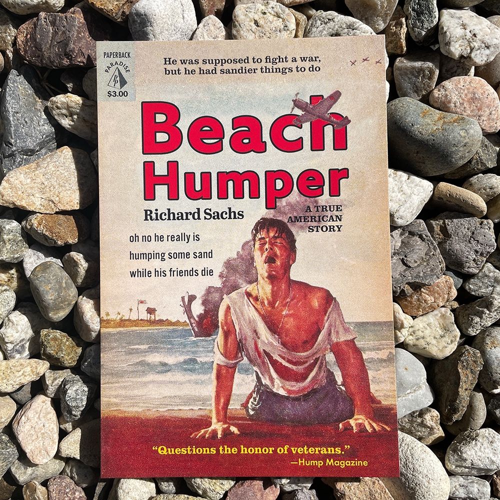 Photo of a postcard of the paperback paradise cover BEACH HUMPER, which features a man gasping for air on the beach but it looks like he crushing that sand 