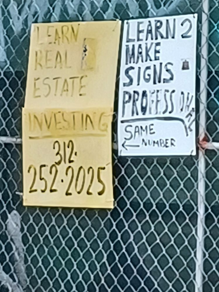 Two poster signs using a waterproof material. The sign on the left is yellow background with black writing in all capital letters reading "Learn real estate investing 312-252-2025." It looks unprofessional. The sign on the right is black writing on a white background and has a drawn on arrow pointing to the left sign. Also, in all capital letters, it reads, "Learn 2 make signs professional." That last word exceeded the width of the sign, so the end letters are crowded against the right margin and angling downward. Under the last word is a thick black line, which follows the angling of the letters. Below the line are the words "same number" with the aforementioned arrow.