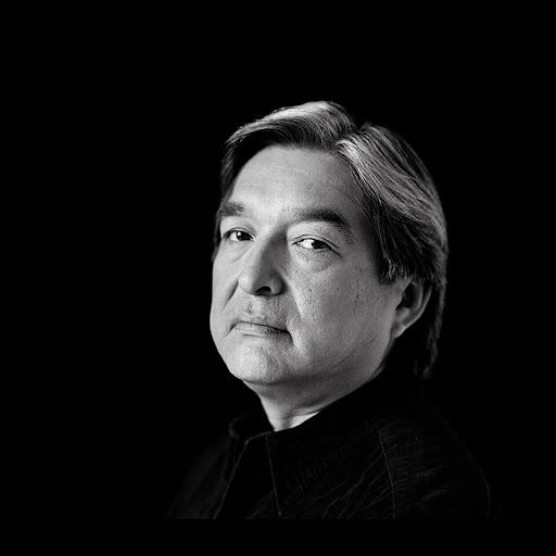 A headshot of actor Graham Greene. 