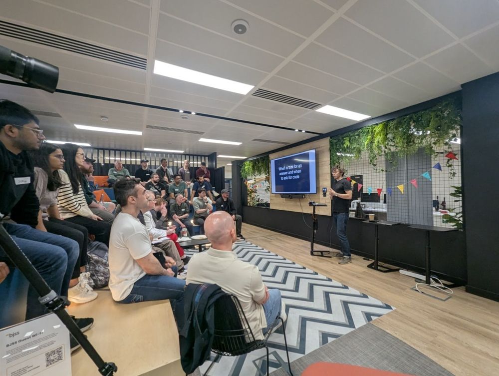Allan speaking in front of the GlasgowJs audience