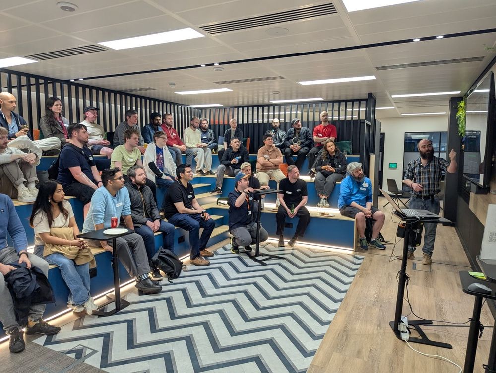 Audience listening to Samuel speak
