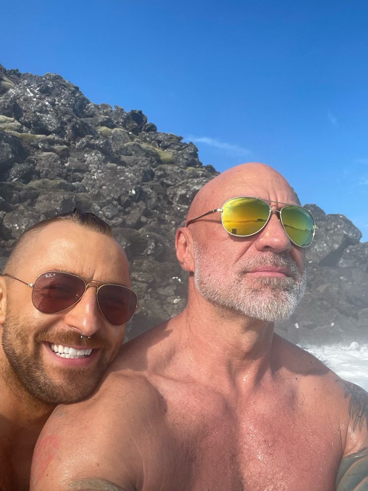 Two homos on their honeymoon, sitting in a warm (38° C) volcanic lagoon outside Reykjavik