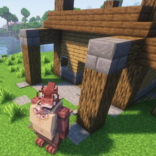 Rexy standing outside a simple wooden house