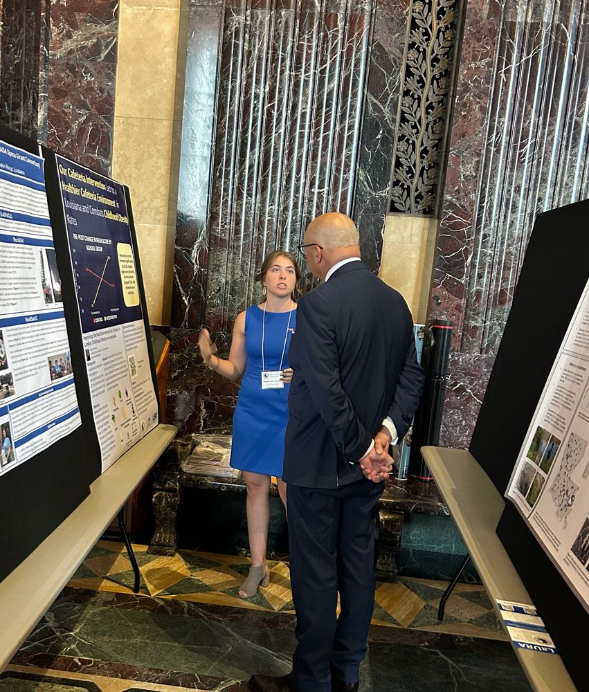 LSU researcher Jena Bordelon chats with LSU Interim President Dr. Matt Lee about her research on improving the food environment in Louisiana schools.
