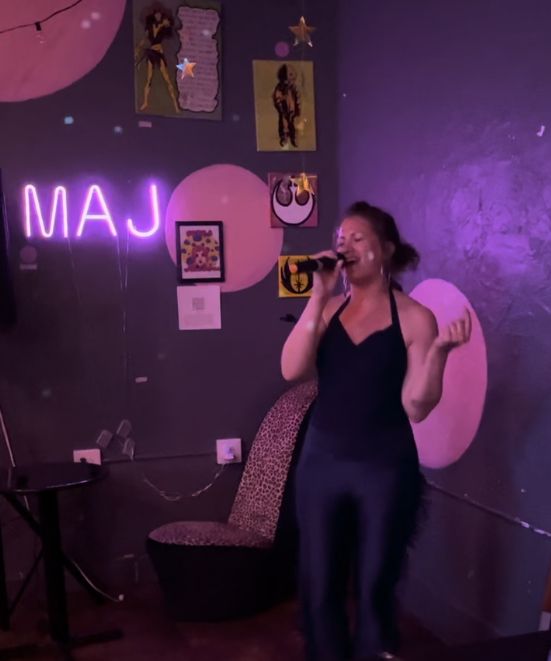 Kristina Smiley sings karaoke at the Majestic in Northampton Massachusetts. Photo courtesy of Kristina Smiley.