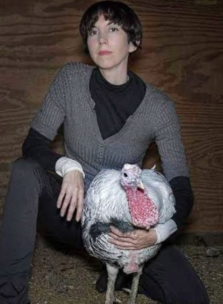 Me holding my rescue turkey. Happy thanksliving. 