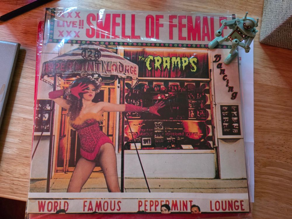 A photo of The Cramps' live album, "Smell of Female"