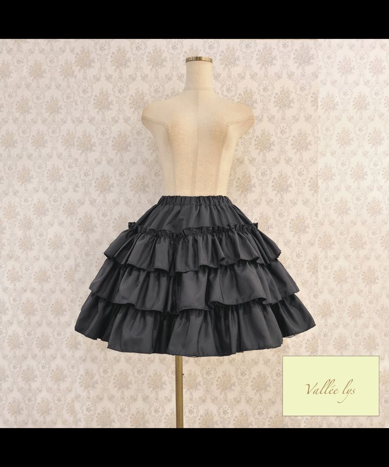 A black, 3 tiered ruffled skirt