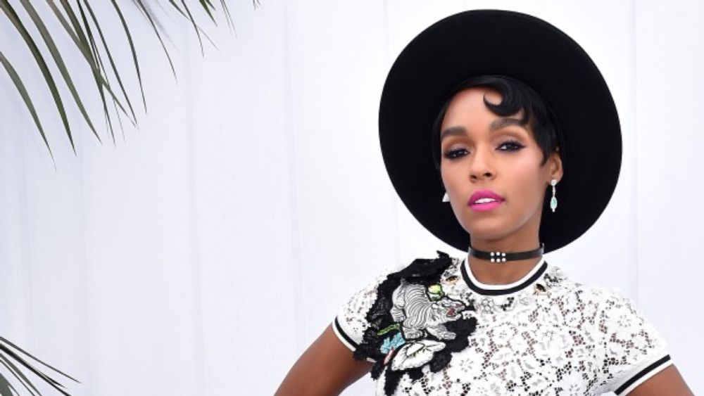 Janelle Monáe wants you to be happy. And then she wants you to fight.