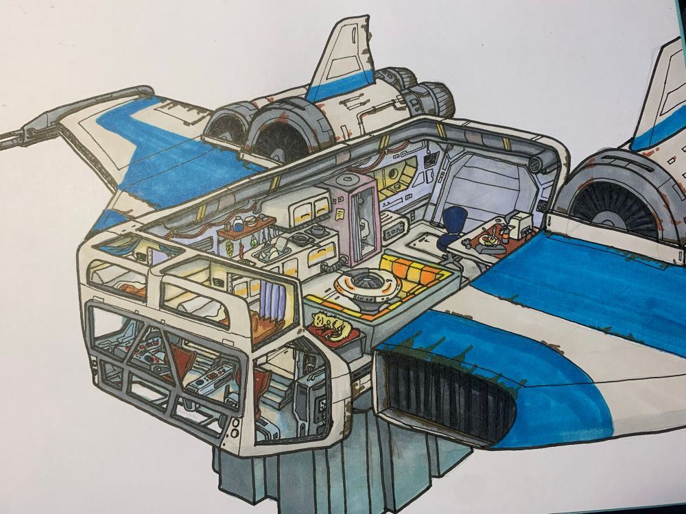 A Star Wars spaceship cross-section showing a small spaceship with a two-seater cockpit, two loft beds, a kitchen, and a workstation. It’s giving Van-life in space vibes. 