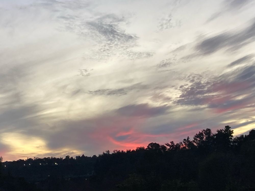 A cloudy sky as the sun sets