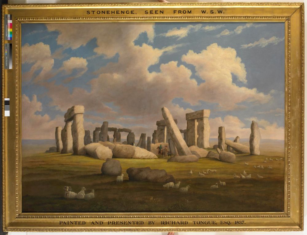 Depiction of a prehistoric megalithic structure. The standing stones are places in a circle, some connected by horizontal lintel stones. Some stones have fallen over. Cloudy sky. In the foreground sheep and two boulders.