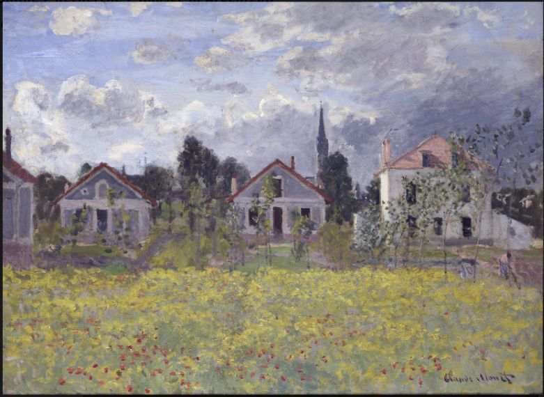 Horizontal row of free-standing houses with red roof tiles. A row of small trees in front between the houses and the viewer and a field of flowers in the foreground. Behind the houses larger trees and a church tower. Cloudy sky.