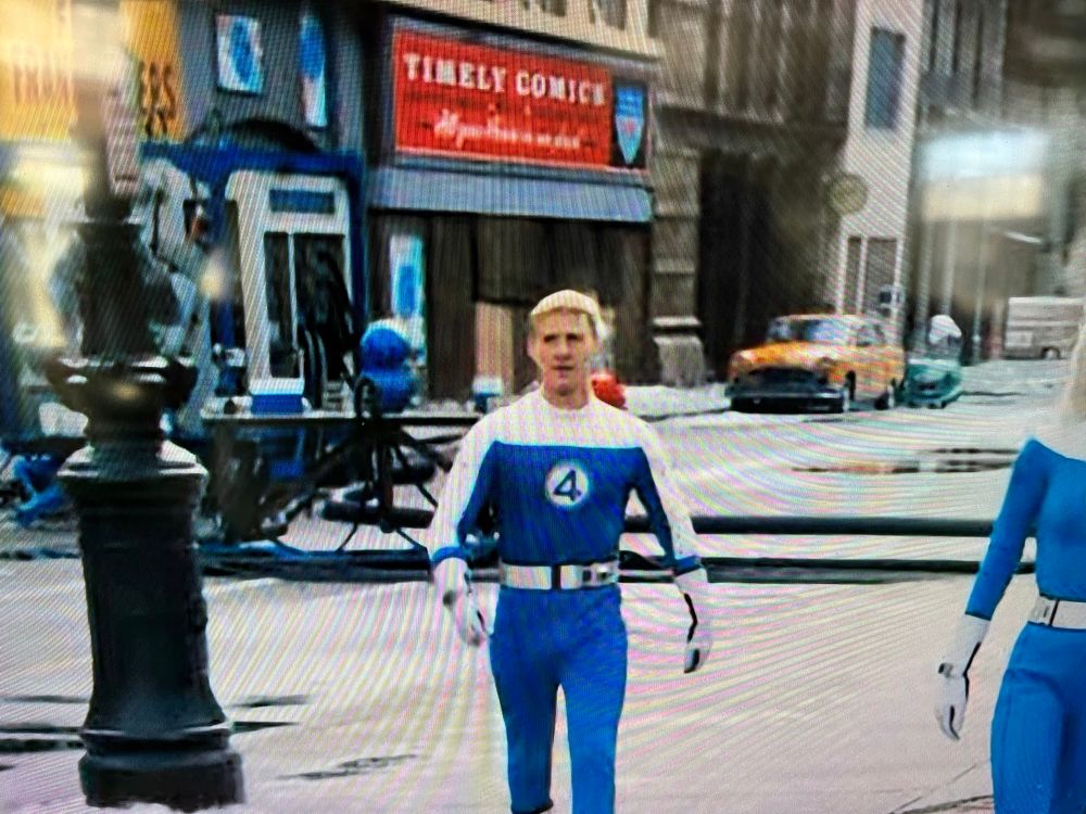 Joseph Quinn as Johnny Storm is seen in front of a sign that reads “Timely Comics” in the trailer for the Marvel Studios film “Fantastic Four: First Steps.”