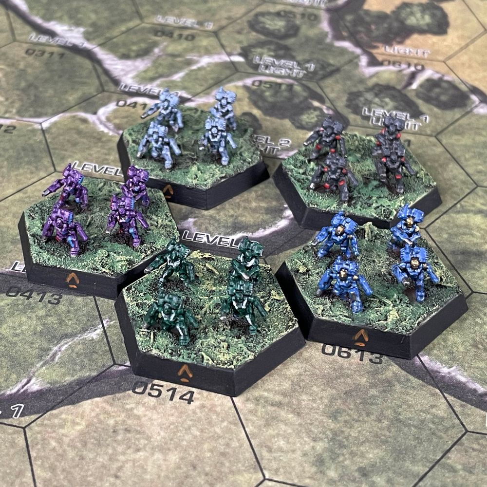 Wrapping us up, Scott Boehmer painted up a squad of Inner Sphere Battle Armor for each great house! Those Marik Militia BA pop!