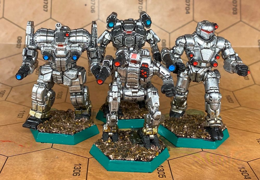 Coming in old school, SteinerB painted up a lance of early, chromed out McCarron's Armored Cavalry! I like to think that their command lances still paint up this way!