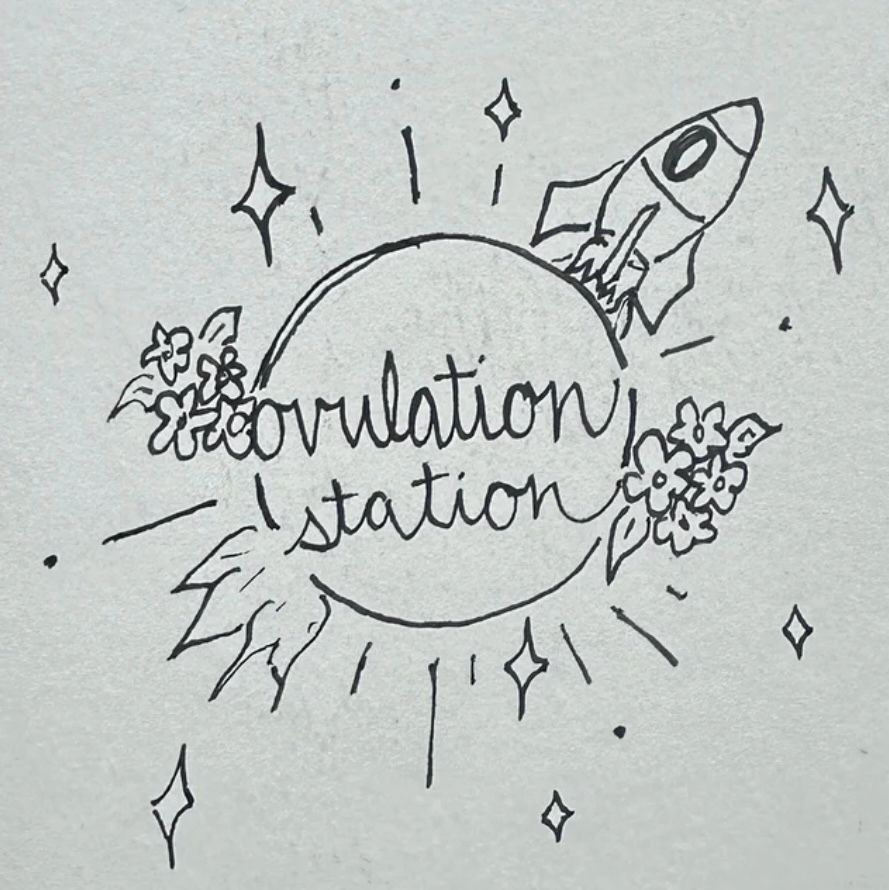hand drawn doodle of the cursive words “ovulation station” over top of a planet with flowers on the left and right side and a rocketship leaving the planet. Stars and straight lines coming off the planet. 