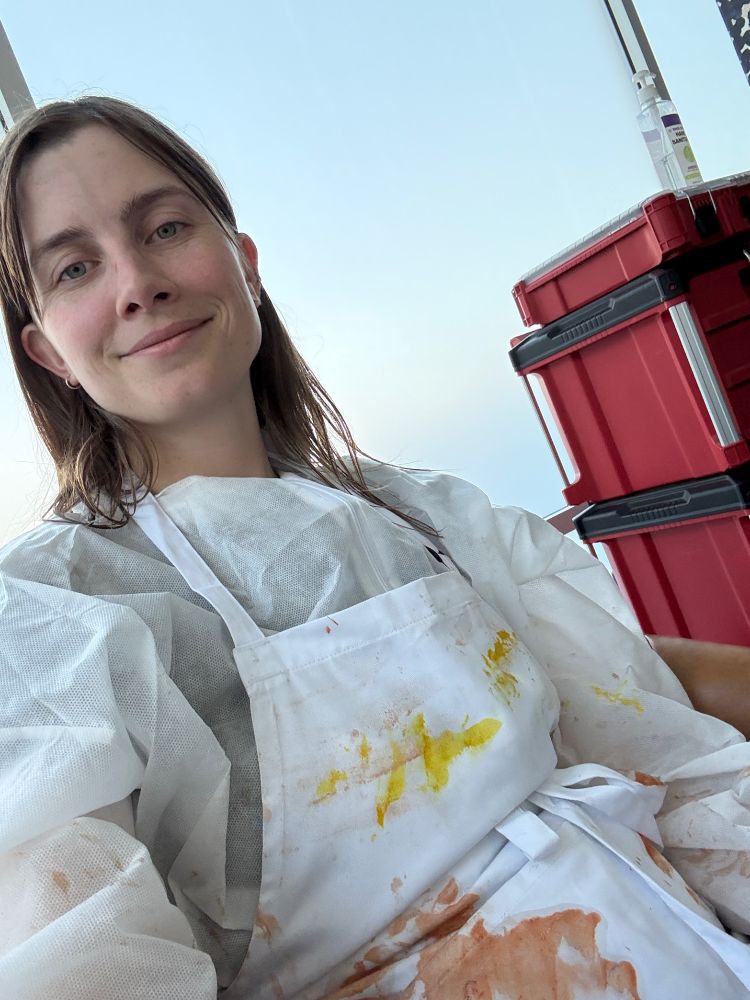 Me sitting with a stained apron smiling because I got my ass kicked by escape the kitchen 
