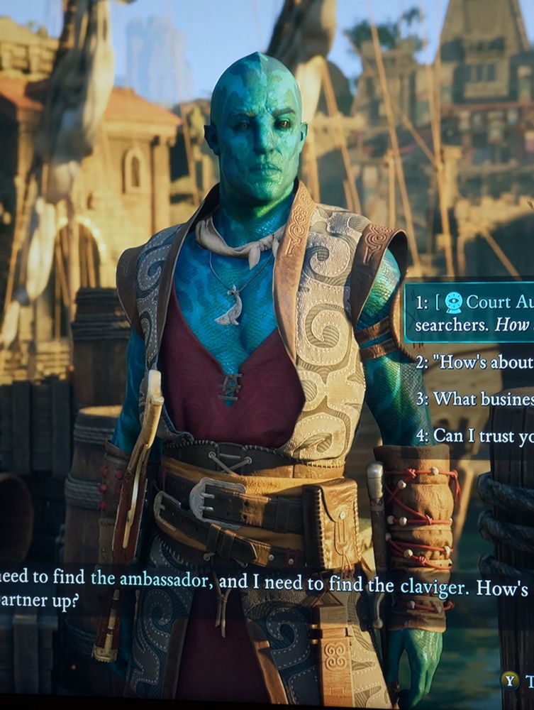 Screenshot of Kai from Avowed, a bluish green fish man