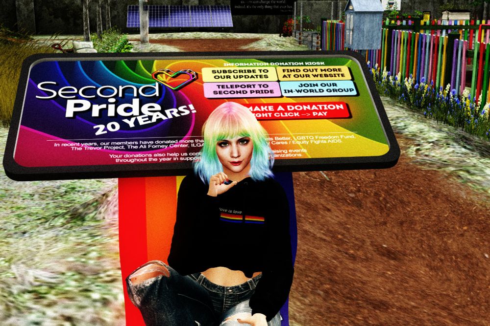 Next to a path in a park, a woman with rainbow-coloured hair sits in front of a vendor for Second Pride in Second Life.