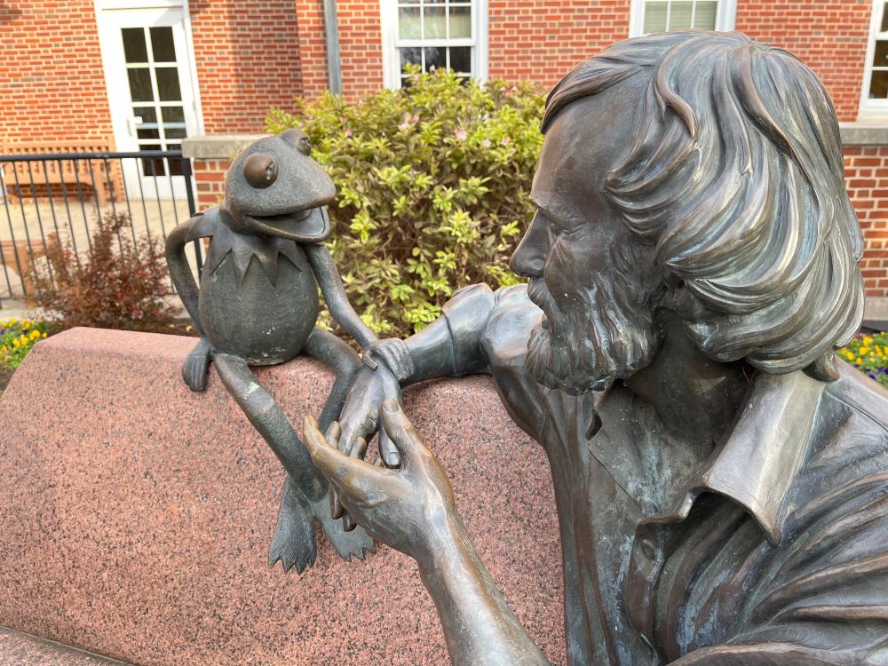 Closeup on statue of Kermit the Frog and Jim Henson. Note Kermit’s hand on Jim’s wrist, and the look of the mutual respect between them. Try not to cry.