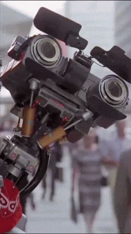 a robot with a red bandana that says supreme