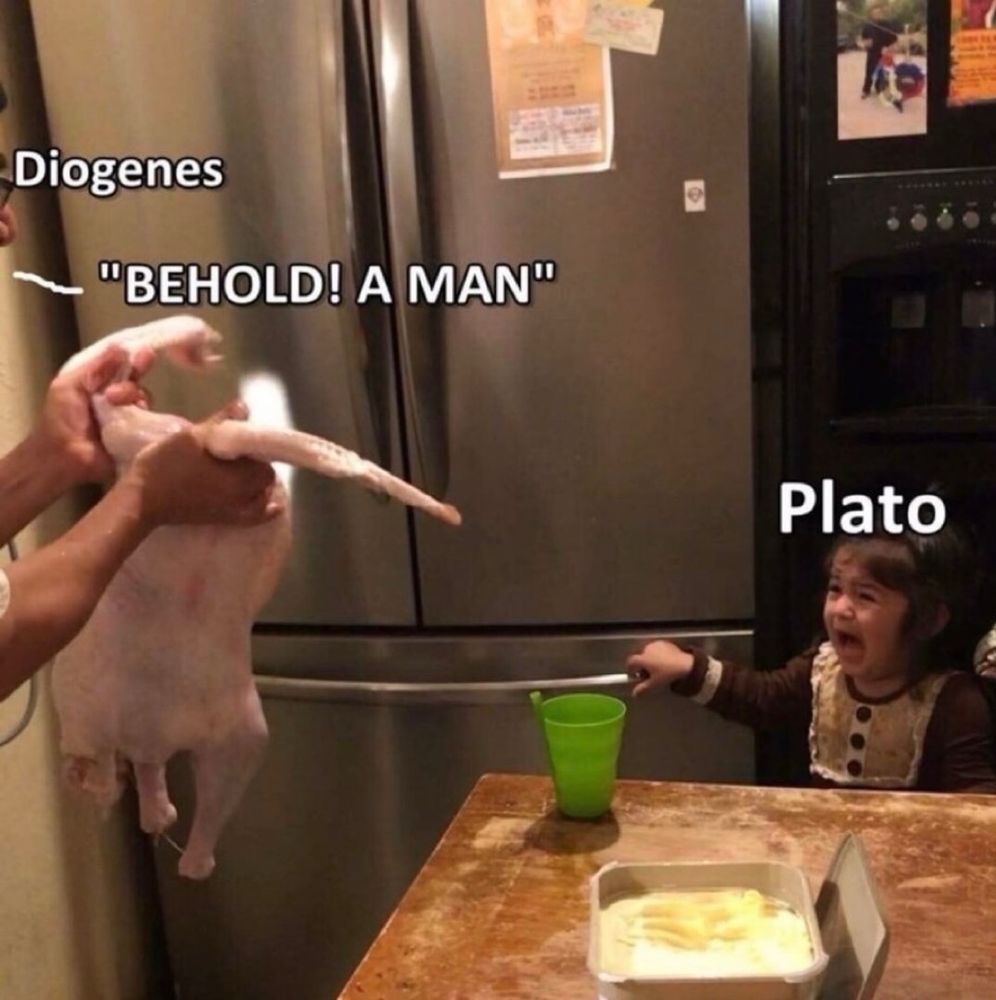 Hands (labeled “Diogenes”) saying “BEHOLD! A MAN!” and holding a chicken carcass up threateningly towards a little girl screaming in terror (labeled “Plato”).