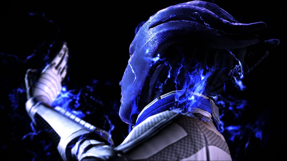 A screenshot from the video game Mass Effect 3 from the Legendary Edition.

The photo depicts Liara T'soni, an alien companion, surrounded by energy as she pushes her hand out, sending out an energy wave. She stands alone in the darkness, with most of her features unseen.