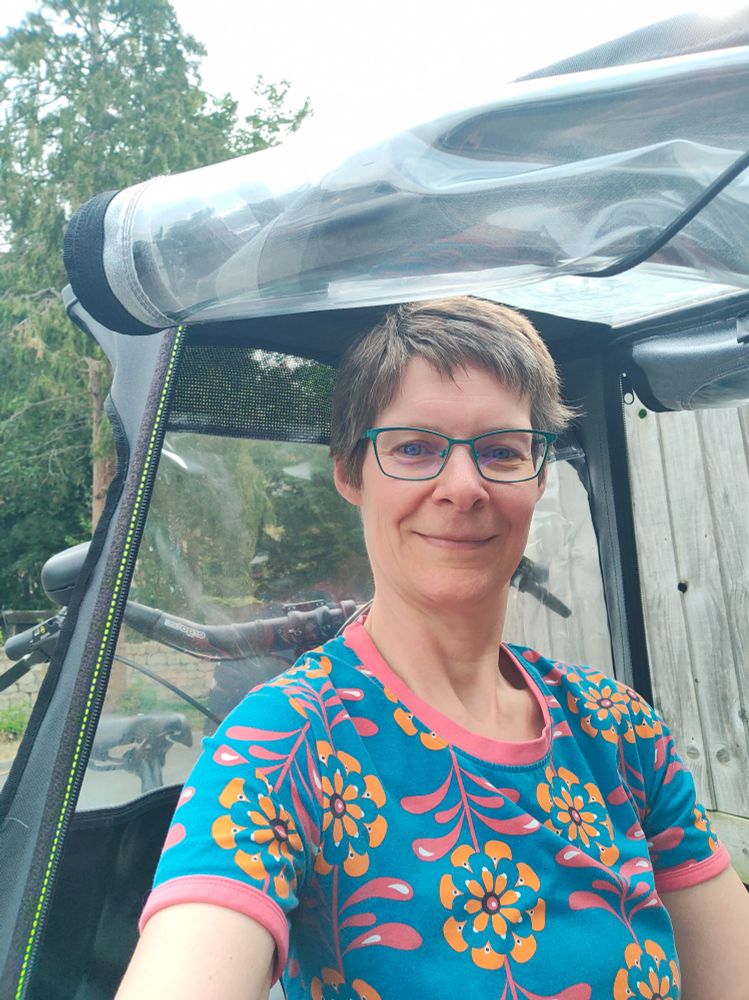 Saskia sitting in the Urban Arrow Family cargo bike 