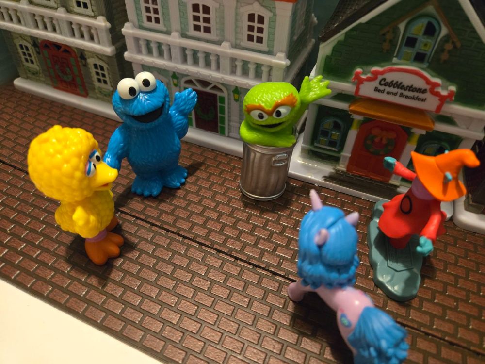 Big Bird: Well Oscar I see you met some new Friends here?

Cookie Monster: Me Cookie Monster, Me Still looking for Cookie Shop.

Oscar: Friends with them? Don't make me laugh, one of them is annoying.

Izzy: Hey you leave Orko be!

Oscar: I'm talking about you Unicorn! I'm getting out of here and find some other place where I can get some peace & quiet.