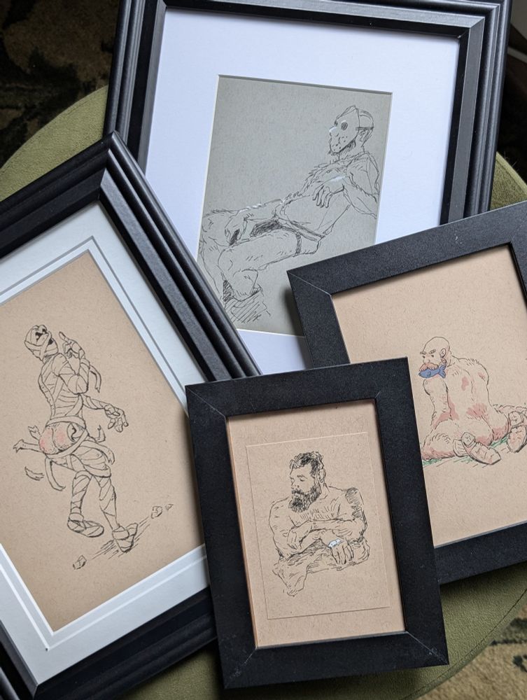 A stack of my framed artwork for sale