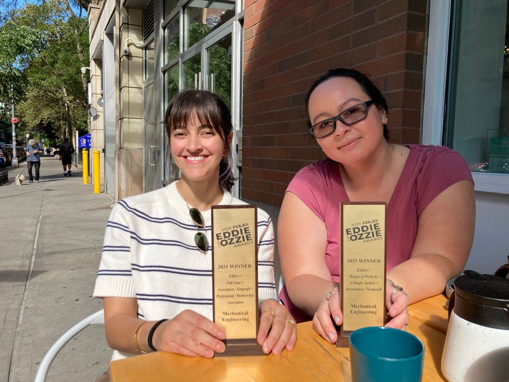 Sarah Alburakeh and Louise Poirier with the trophies for best single issue and best body of work. 