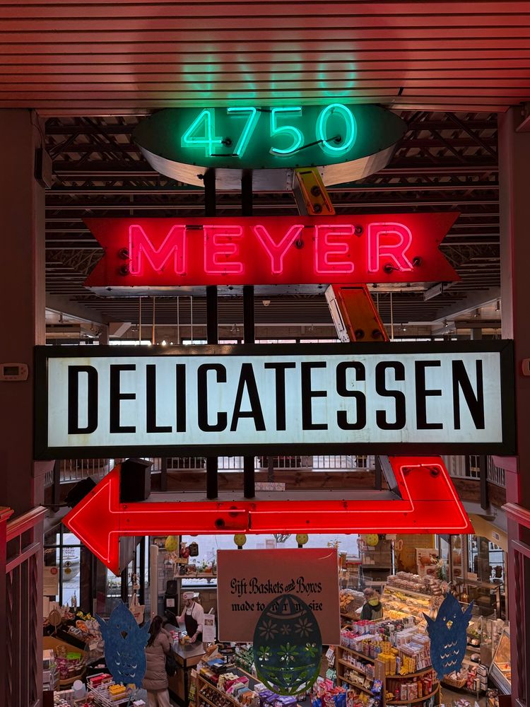 Old storefront sign for Meyer Delicatessen. 