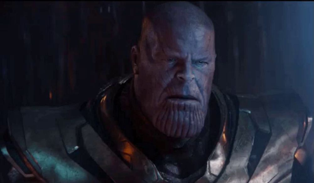 thanos from avengers infinity war is shown with the word impossible behind him