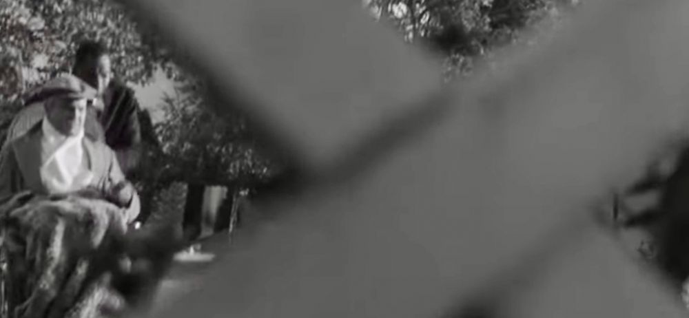 Newsreel clip from the movie Citizen Kane, showing an infirmed Kane being transported on his estate via a wheelchair.