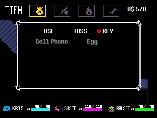 A Deltarune Chapter 1 screenshot in the basement leading to Jevil's boss fight. The door to Jevil is gone, as he has already been defeated. However, the key items menu is open, and there is no Shadow Crystal, only the Cell Phone and the Egg.