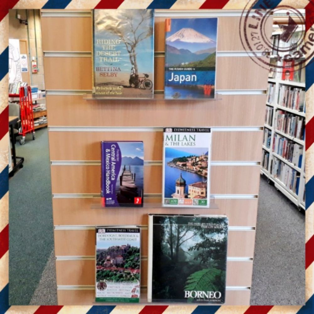 A display of travel books for the deserts of Sudan, Japan, Yucatan, Milan, Bordeaux and Borneo
