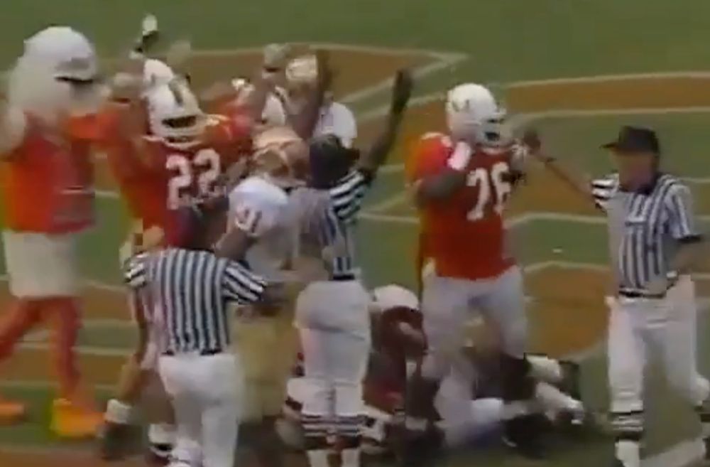 An image from an incredible safety in the 1992 Miami-Florida State game where Sebastian the Ibis is on the field celebrating in the end zone with Miami players