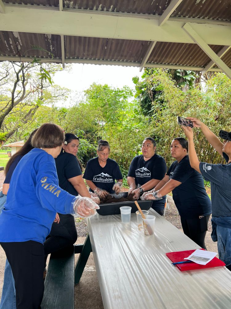 Volunteers help make genki balls throughout the year. 