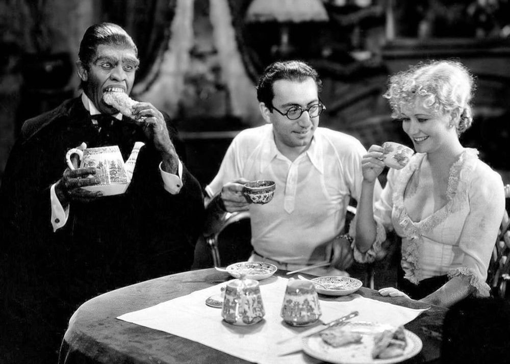Fredric March on the set of 