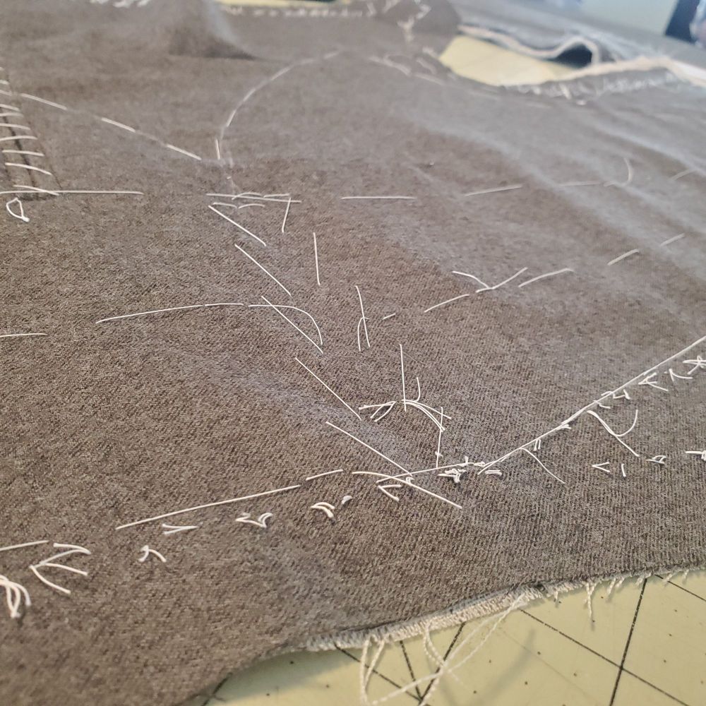 Close up of a basted jacket panel