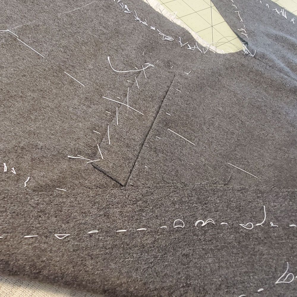 Close up of stitching on a jacket pocket