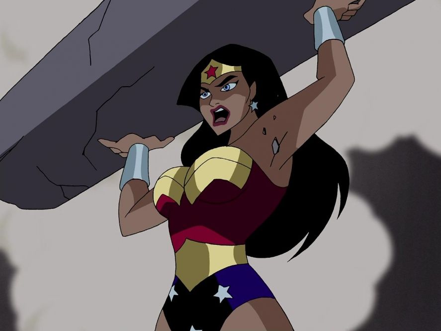In the unedited screenshot, Wonder woman is angrily yelling and lifting a cracked concrete pillar above her head. She looks like she's gonna chuck it at someone.